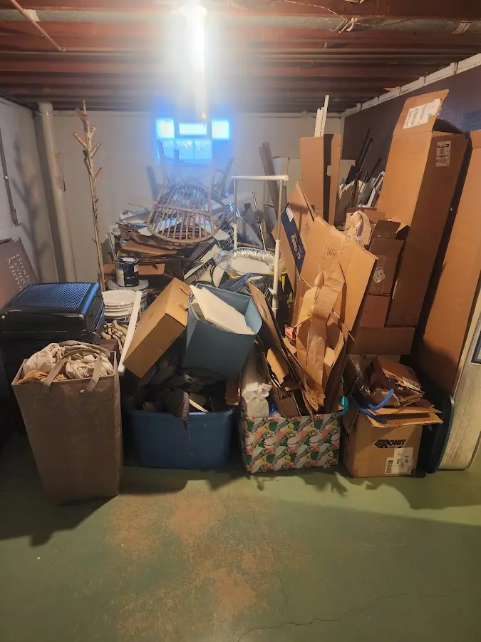 Roll-off dumpster container at job site for 4 Yard Dumpster Rental in Craig